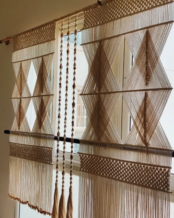 This is one of the most challenging and rewarding pieces I've ever made. It's a large macrame partition, designed with a precise geometric diamond pattern to divide a living space while keeping it bright and airy. Creating such a large, intricate piece required so much focus, but seeing it transform a room makes all the effort worthwhile.