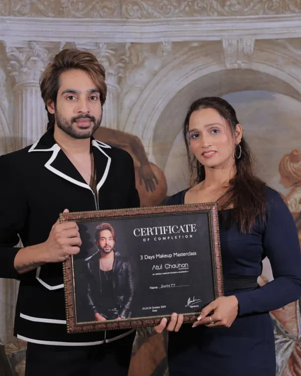 A proud moment, awarding a certificate of completion to a talented student after our 3-day makeup masterclass.