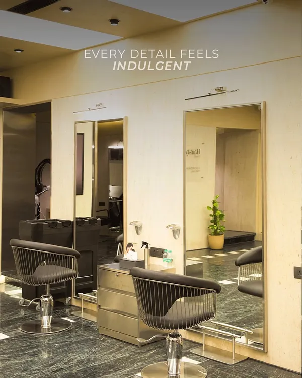 Every detail in our salon is designed to feel indulgent. The men's section features modern styling chairs and clean lines for a sophisticated grooming experience.