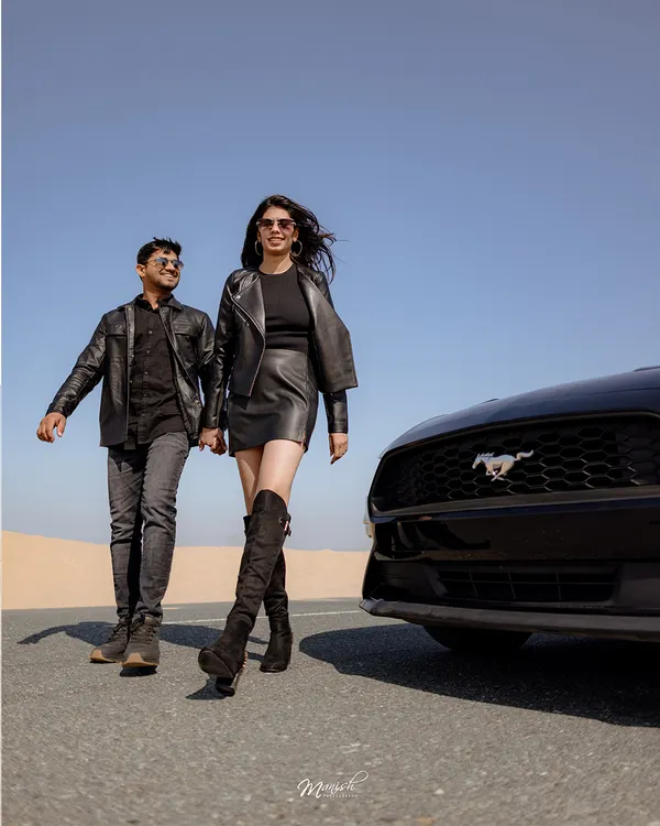 Walking hand-in-hand down a desert road in Dubai. This shot from Saurabh and Simran's pre-wedding shoot is straight out of a movie scene.