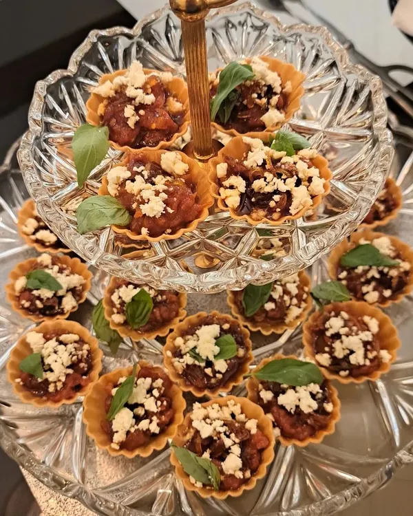 These Balsamic Tomato and Feta Tarts are perfect for high tea catering or as an elegant starter. They are presented on a tiered stand to make a beautiful addition to your party spread.