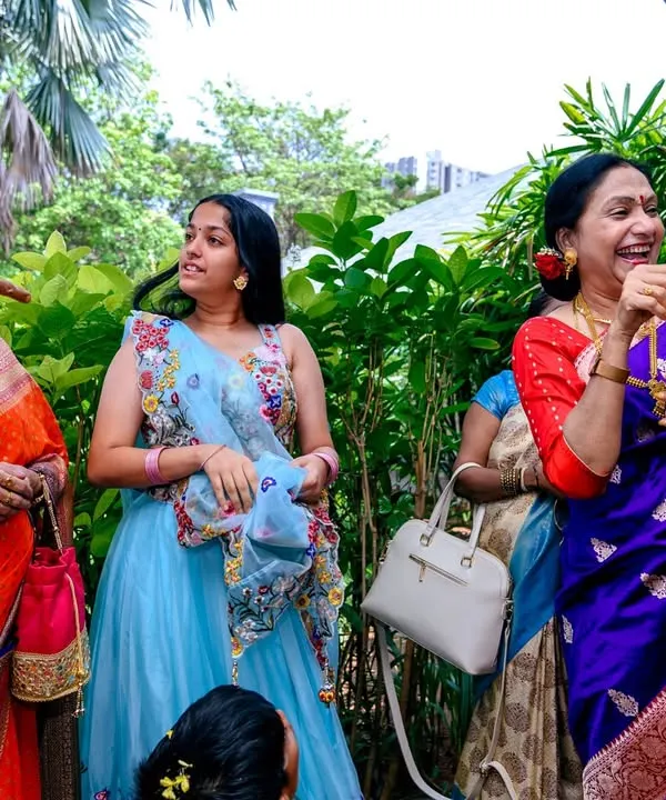 Capturing the candid laughter and joy of family members at an Upanayanam (thread ceremony). My event photography is about documenting these real, unposed moments.