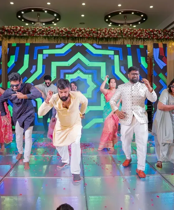 The groom's crew takes over the stage with a perfectly synchronized performance. We love choreographing routines for friends that are full of energy and attitude, making for an unforgettable highlight of the sangeet night.
