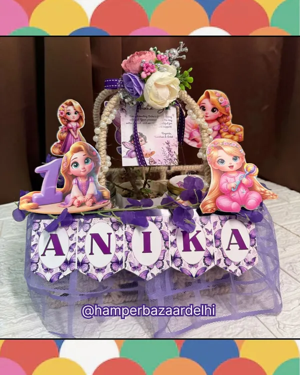 A beautiful, fully customized Rapunzel-themed hamper for Anika's first birthday, showcasing our ability to work with any character theme.