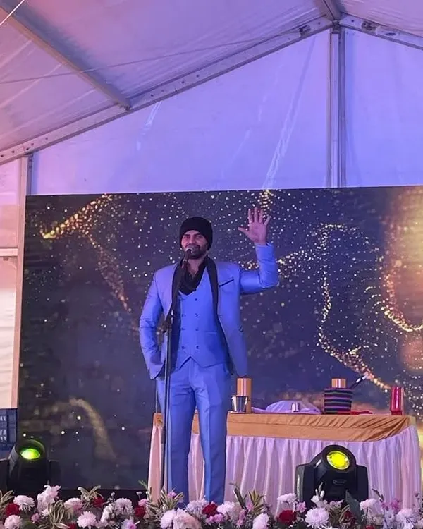 On stage during a property launch for MJR Builders. I combine my hosting duties with a magic performance to make the launch event more dynamic and memorable for potential buyers.