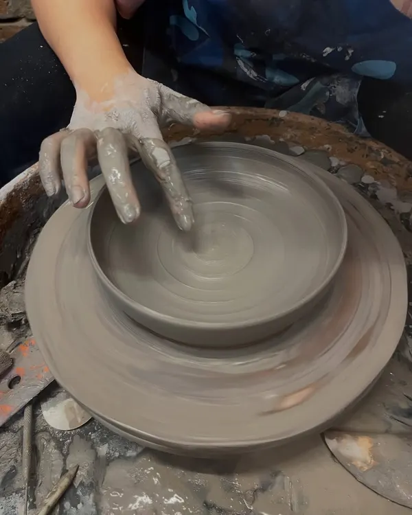 This is the moment it all starts to take shape. A gentle touch is all it takes to guide the clay.