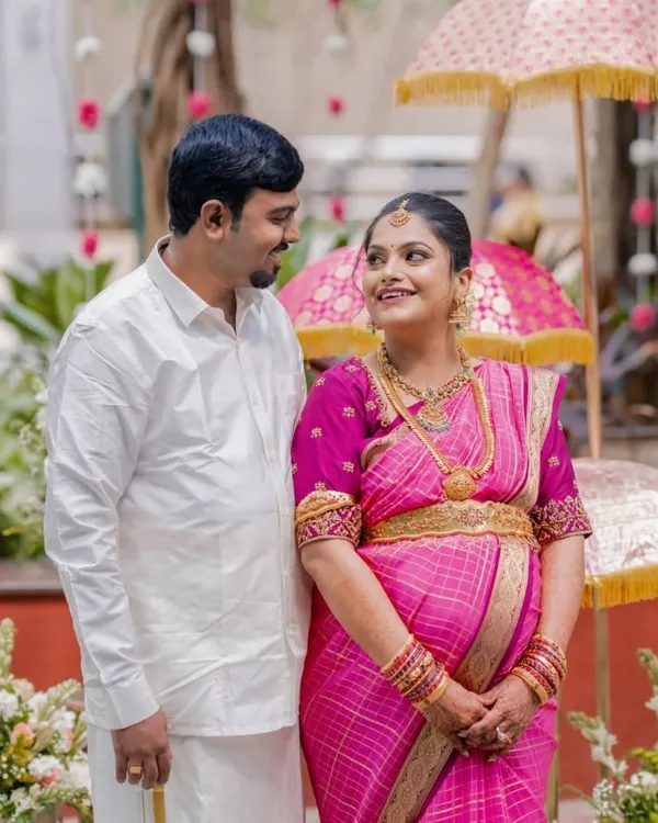 A close-up, candid photo of the couple sharing a look of love during their baby shower. These are the simple, heartfelt moments I strive to capture amidst the day's celebrations.