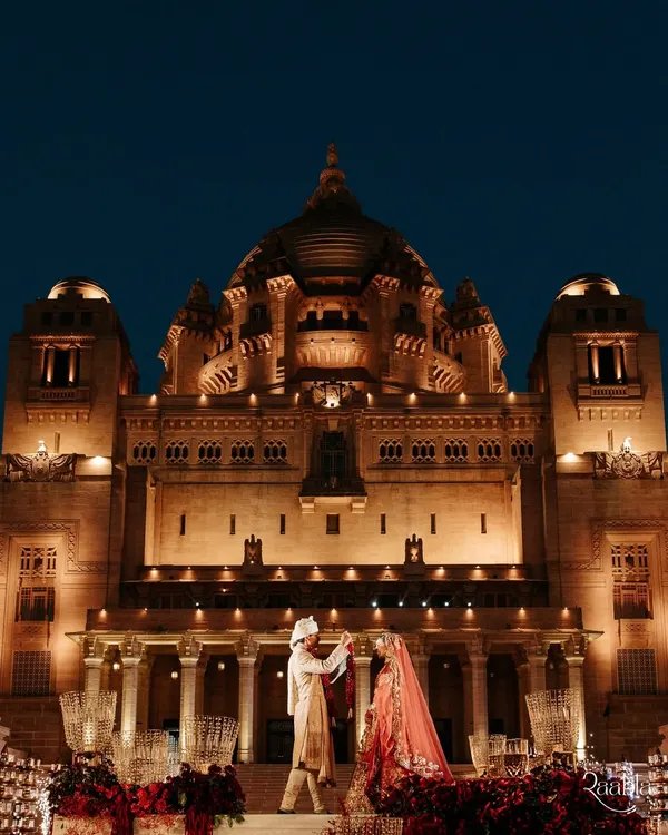 A varmala ceremony fit for royalty, set against the breathtaking Umaid Bhawan Palace. We orchestrate these monumental moments, ensuring the grandeur of the setting is matched only by the intimacy of the memory being made.