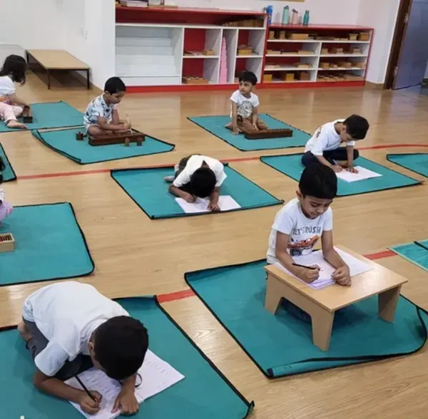 This is what a day at Prayag looks like. Children are deeply engaged in their chosen work, learning at their own pace in a calm and prepared environment. This focus is the foundation of a lifelong love for learning.