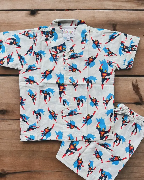 Let your little one feel like the hero he is in our Superman print co-ord set. Made from pure, soft cotton, this two-piece pajama is perfect for saving the world in his dreams or just a comfortable day of play around the house.