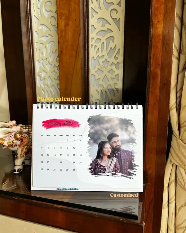 This is my spiral-bound custom desk calendar for 2025, featuring a beautiful couple's photo. Each month can be personalized with a different picture to celebrate your memories.