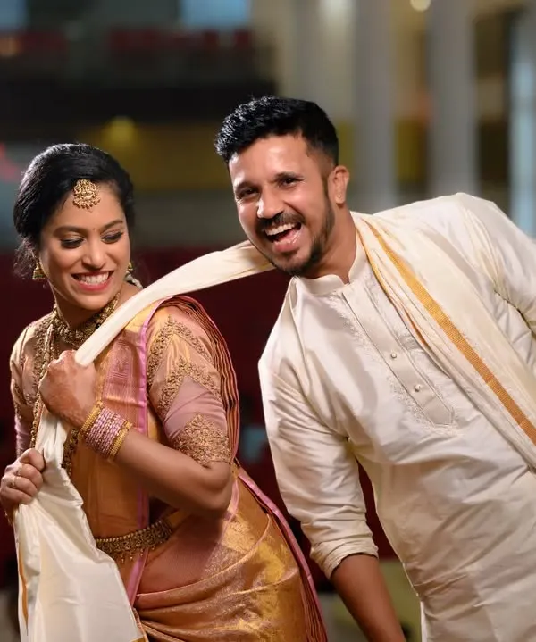 A fun, candid moment between the bride and groom during their wedding festivities. Capturing these playful, unscripted interactions is what makes wedding photography so special to me.
