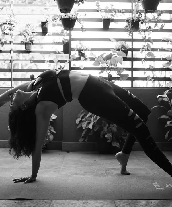 This is Camatkarasana, or Wild Thing. For me, it represents the beauty of finding strength and openness in unexpected ways. My practice is all about exploring what your body can do with mindful movement and a little bit of grace.