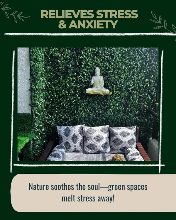To create a space for stress relief, I combined a dense green wall with a serene, white Buddha statue. The comfortable bench with patterned cushions provides the perfect spot for quiet contemplation and helps melt away the day's anxieties.