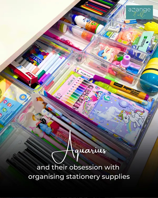 An Aquarius's obsession: a perfectly organized stationery drawer. This kid's desk drawer is a rainbow of pens, pencils, and craft supplies in clear dividers.