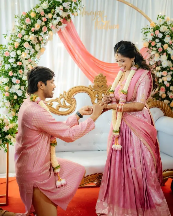 A beautiful moment from Shreya's engagement. I gave her a soft, romantic look with a pink saree that made her glow. It's all about creating a look that feels like you, just a little extra special.