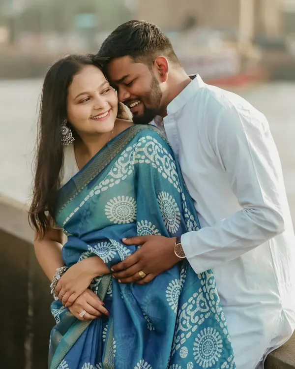 An old-school romance in the modern world. This intimate portrait of Abhishek and Saloni in traditional attire captures a moment of pure affection and joy.