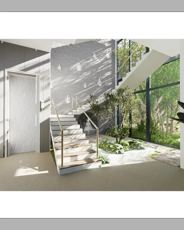 This staircase in our Courtyard Glasshouse project is the heart of the home. We designed it around an indoor garden, allowing dappled sunlight to filter through the space, creating a living connection between the interiors and the natural world.