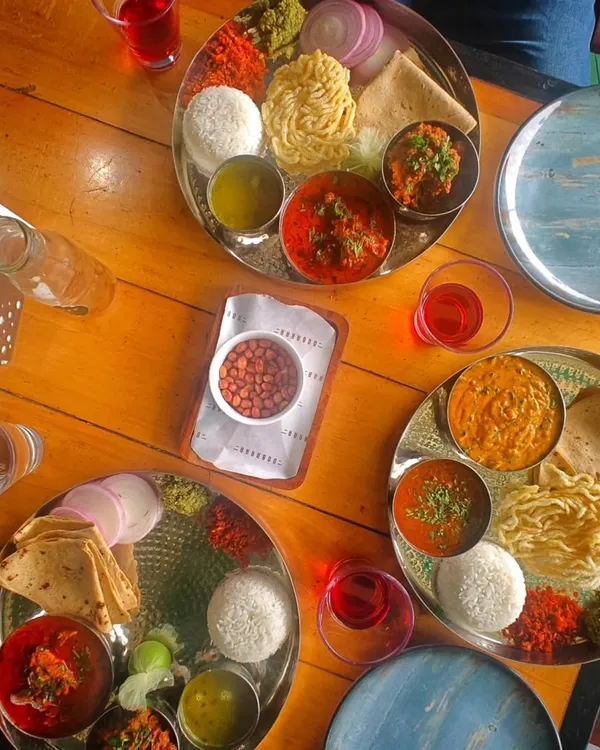 This is what my Kolhapuri thali is all about, a full-blown feast! It’s a vibrant spread with everything from spicy curries to cooling salads, just like the meals I grew up with. This is the heart of my home dining experience.