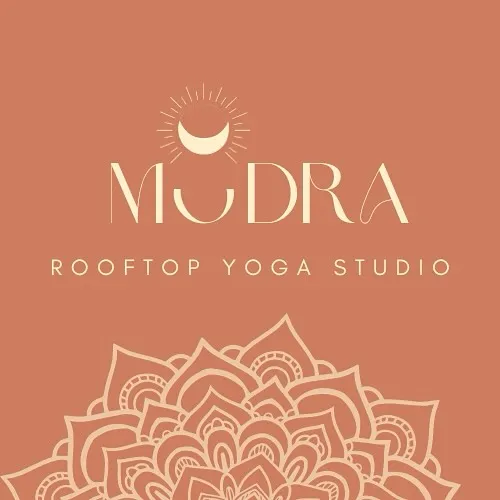 The official logo for Mudra Rooftop Yoga Studio. The design reflects my commitment to holistic wellness, mindfulness, and creating a serene space for our community.
