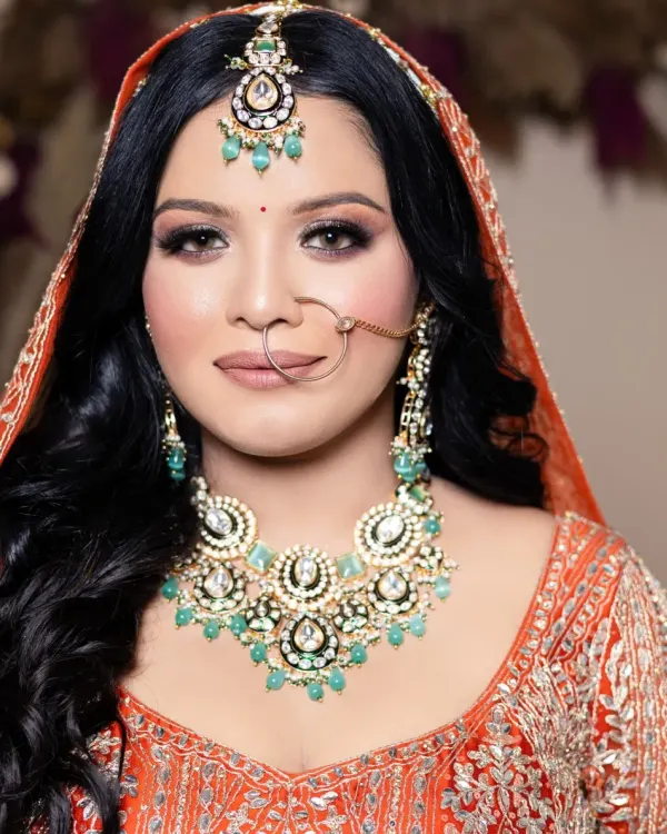 This is the level of perfection you can achieve. This photo is from a student's portfolio shoot, showing a flawless bridal look with soft glam eyes and a perfectly blended base, ready to attract their first clients.