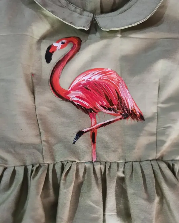 This vibrant flamingo was hand-painted on a dress during my fabric painting workshop. You can learn to customize your own clothes and textiles with permanent, colorful designs.