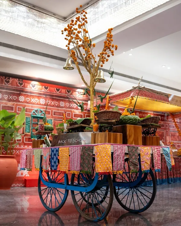 We love to spark joy and conversation with unique concepts like our 'Back to School' cart. This vibrant, interactive station, adorned with colourful textiles and brass bells, serves an array of khatta-meetha treats that transport your guests back to cherished childhood days.