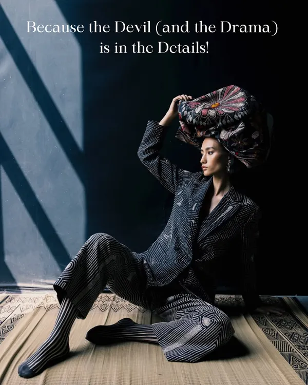 The devil is in the details. For this editorial concept, I used a dramatic headpiece and a structured, patterned suit to create a high-fashion look that is both artistic and powerful.