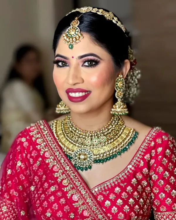 This is the moment every bride dreams of. I love helping you find the perfect, radiant Kundan bridal set that makes you feel like royalty on your wedding day. This stunning gold-plated choker with green beadwork is available for rent.