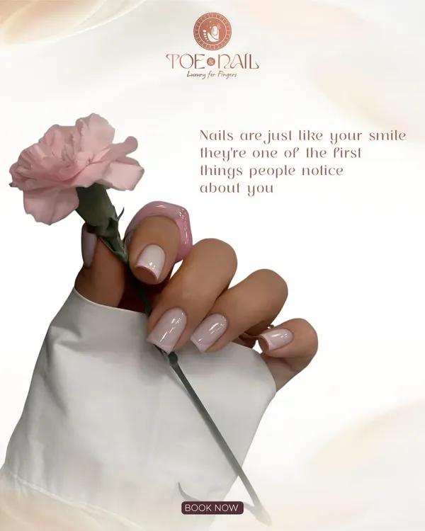 A beautiful example of a classic French manicure on perfectly shaped square nails. This timeless and elegant style is perfect for any occasion, offering a clean and polished look.