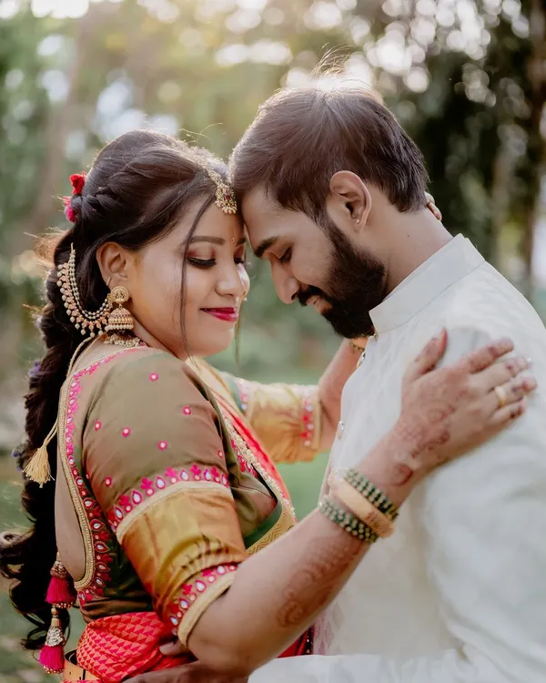 A quiet, intimate portrait that feels completely natural. I often guide couples into gentle poses like this to capture their connection without feeling staged, focusing on the soft light and their expressions.