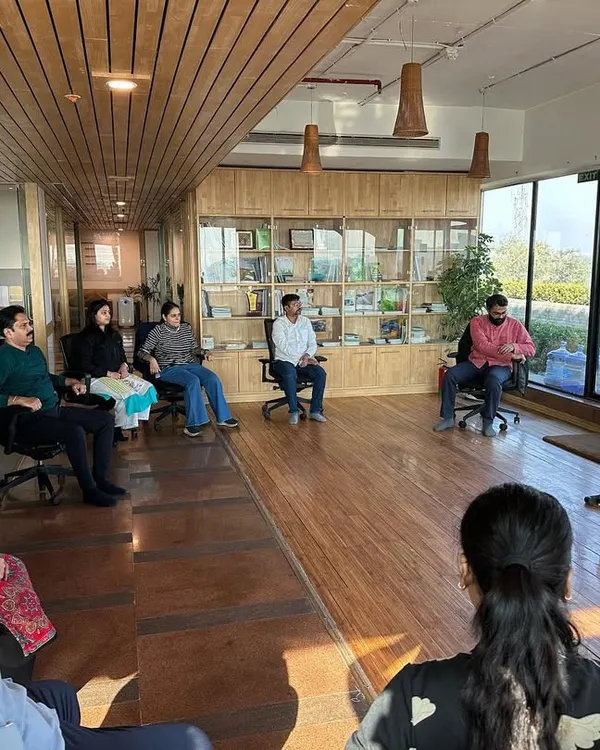 A corporate wellness session is more than just physical exercise, it is a dialogue. Here, I am leading a discussion on the sources of workplace stress and how yogic philosophy offers practical tools for managing them, fostering a more conscious and collaborative team environment.