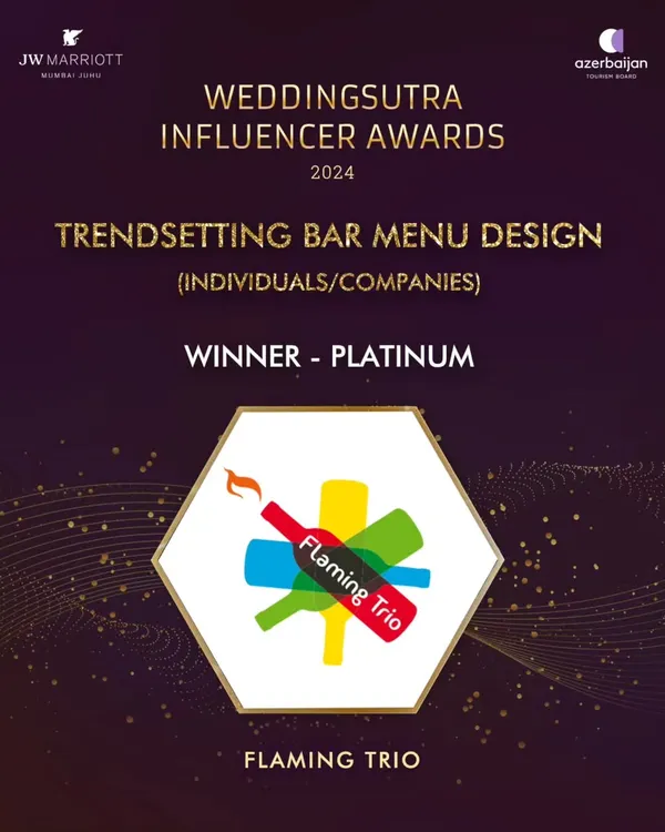 We are proud to be the Platinum Winner for "Trendsetting Bar Menu Design" at the WeddingSutra Influencer Awards 2024. This award recognizes our dedication to creating innovative and stylish menus.