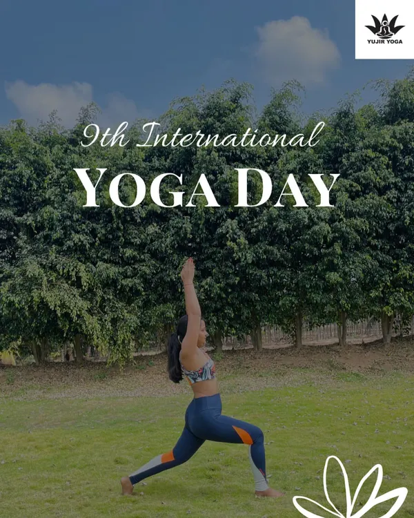 Celebrating International Yoga Day with a powerful Virabhadrasana (Warrior Pose) in a lush green park. Practicing outdoors connects us to the earth's energy.