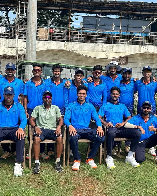 Our team, proudly wearing the club's blue jerseys, poses for a group photo on the field. This picture reflects the unity and readiness of our players for the Kanga Cricket League.