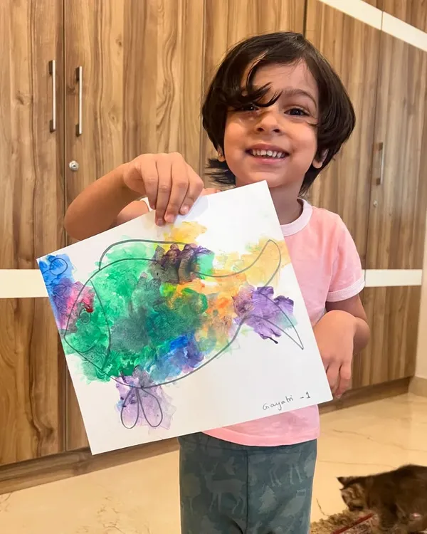A happy smile from one of our junior one-on-one classes! This young artist is showing off his colorful blow-painted fish. Private sessions are a great way to give your child focused attention to grow their skills.