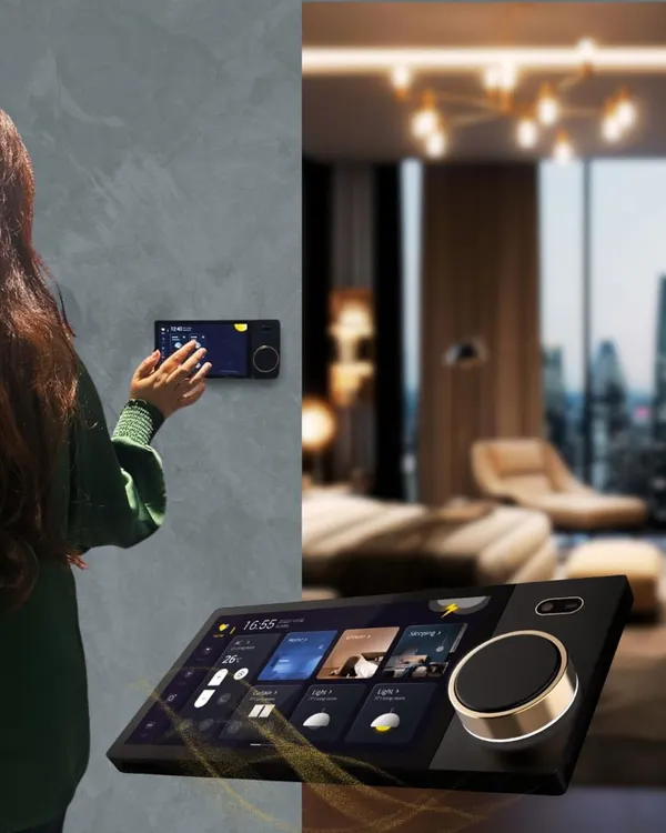 This image perfectly captures the concept of seamless control. A user adjusts the home's environment using an elegant wall-mounted touch panel, which features a large display and an intuitive rotary knob for easy adjustments to lighting, climate, and more.