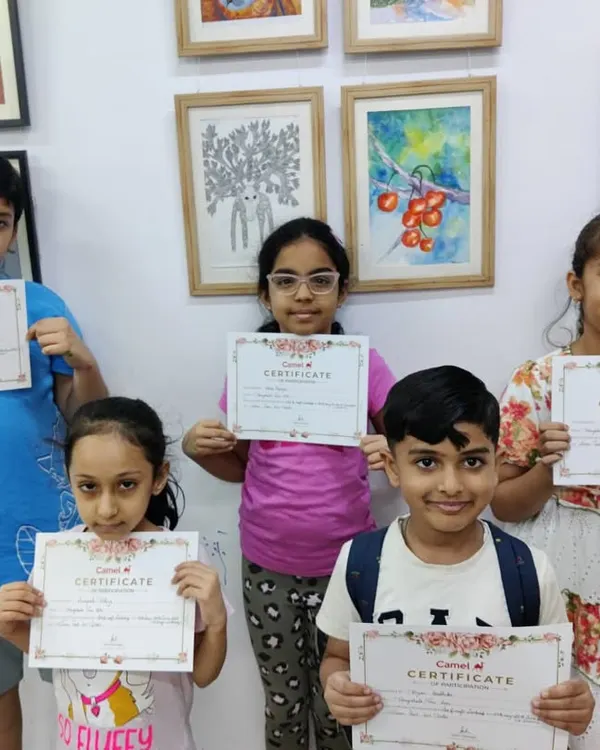 Proud graduates of our one-month summer vacation camp! Every student receives a certificate to celebrate their hard work and creative journey.