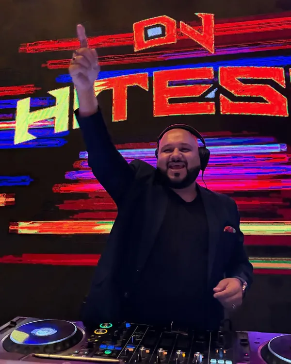 The only way to do great work is to love what you do. This shot captures that feeling perfectly, with my name in lights and the music at my fingertips.