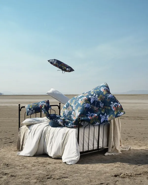 An editorial concept brought to life for a home fashions brand. We placed a fully dressed bed in the middle of a salt flat, creating a striking, surreal image that challenges the viewer's perception of a familiar object.