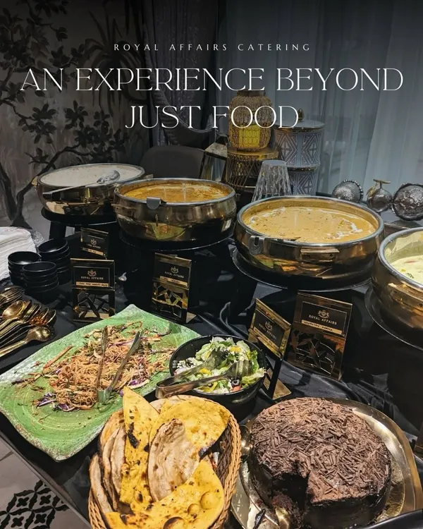 My buffet service is an experience beyond just food. This setup features my signature brass serving dishes, a variety of main courses and salads, and elegant decor, creating a complete and luxurious dining atmosphere.