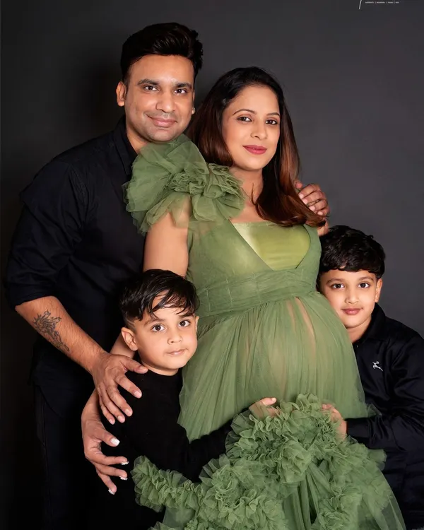 From a family of four to a family of five. The two big brothers are so excited to meet their new sibling. It's a joy to capture the anticipation of the entire family during a maternity session.