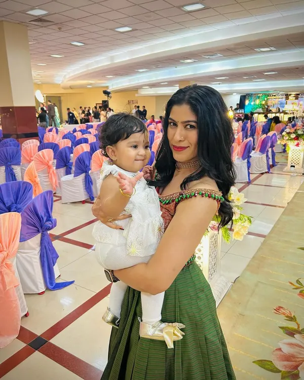 This beautiful moment captures the heart of my work. I transformed this mother's own saree into a delicate and comfortable first ethnic outfit for her baby girl, creating a precious heirloom filled with love and memory.