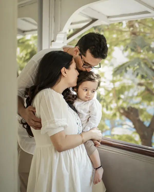 This is what it's all about. That feeling of being a complete world to each other, wrapped in the soft morning light. I aim to capture not just a picture, but the very essence of your family's love story.