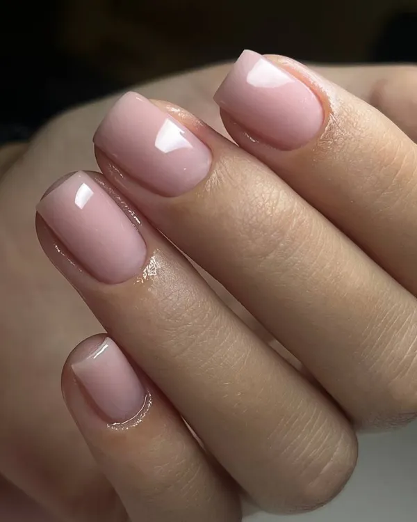 A perfect example of our BIAB (Builder in a Bottle) service on short, natural nails. This beautiful nude pink provides strength and a flawless, smooth finish.