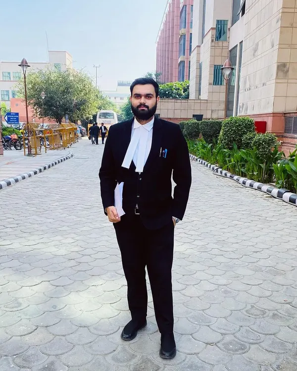 Here I am, ready for the day outside the courthouse. As a criminal defense advocate in Delhi, this is where I fight for my clients, ensuring their voices are heard loud and clear.
