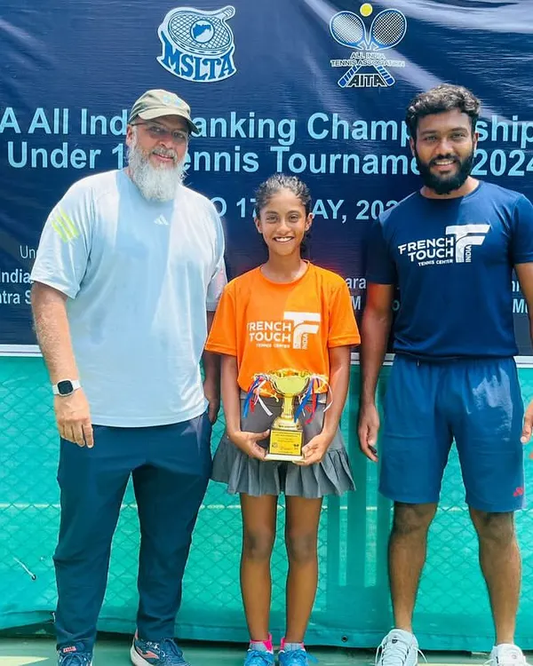 Celebrating a major victory for our academy. One of our coaches stands proudly with champion Eshal Pathan after her win at the U14 AITA Championship Series event in Mumbai.