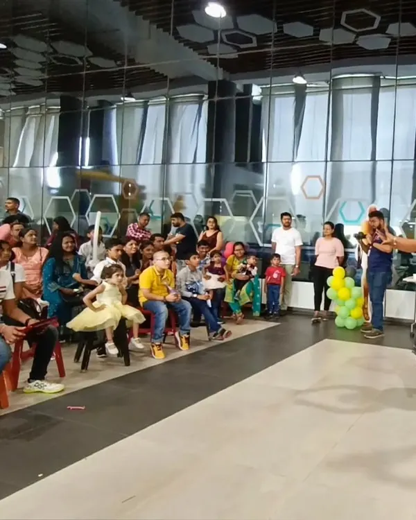 Performing for a fantastic mixed audience at a corporate family day. It's always a joy to see both kids and adults captivated by the same illusion. These events are perfect for team building and celebration.