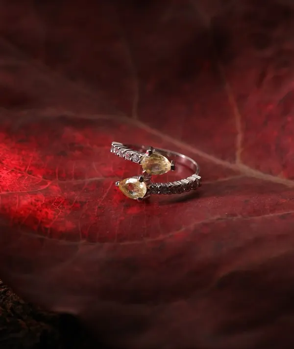 This shot for Glab Jewels showcases our approach to creative product photography. We used dramatic lighting and a natural leaf to highlight the unique design and the sparkle of the yellow gemstones, creating an image that stops the scroll.