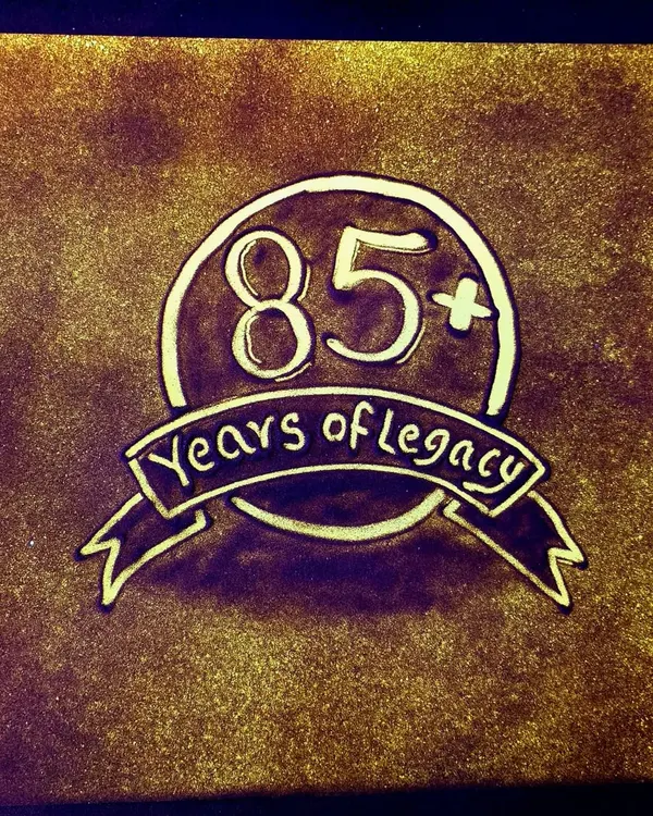 A key moment from the live sand art performance for Crompton, celebrating their "85+ Years of Legacy." This image showcases my ability to create clean, impactful branding and logos in sand, a vital part of any corporate storytelling event.